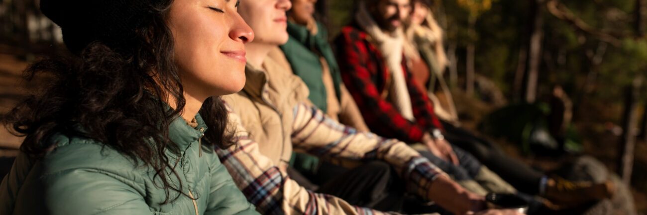 Meditation People meditating outside