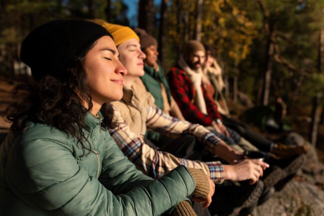 Meditation People meditating outside