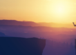 Image: Man about to jump off a cliff