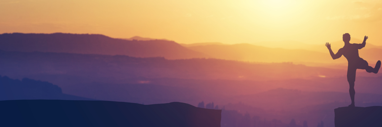 Exploring the Limits of Adventure and Risk-Taking Image: Man about to jump off a cliff