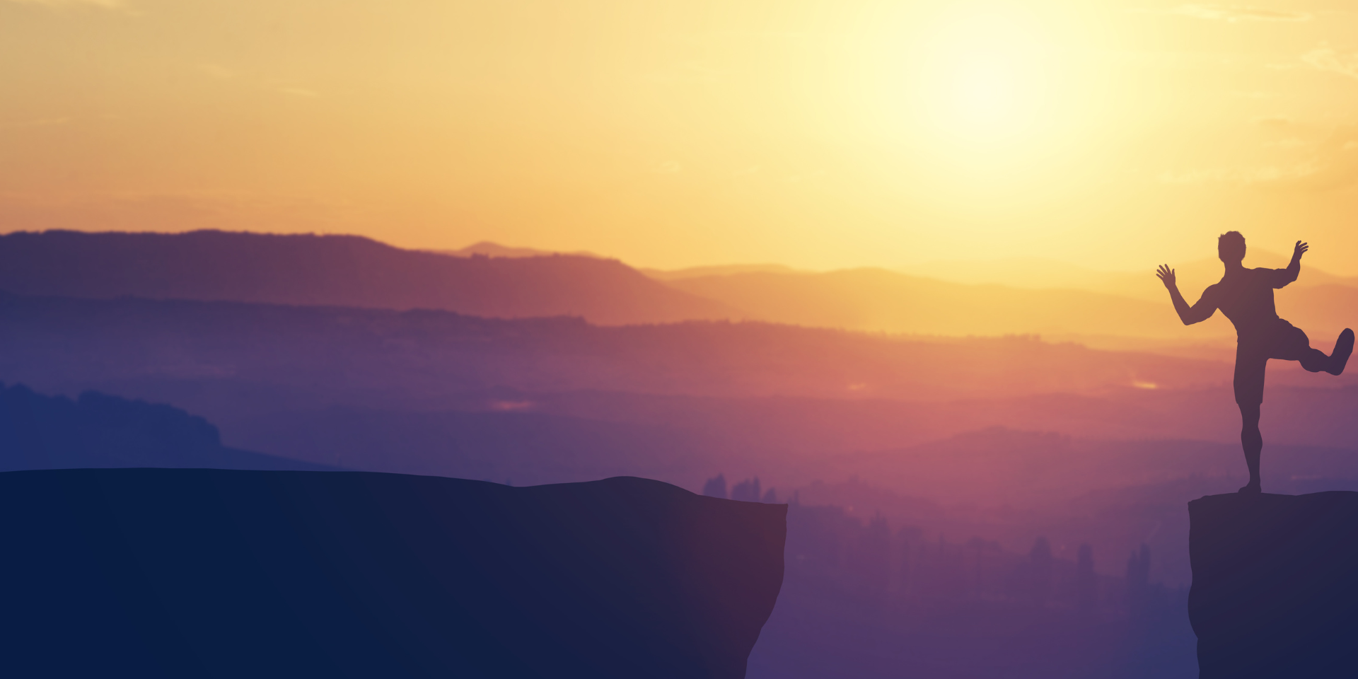Exploring the Limits of Adventure and Risk-Taking Image: Man about to jump off a cliff