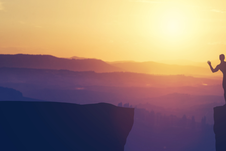 Exploring the Limits of Adventure and Risk-Taking Image: Man about to jump off a cliff