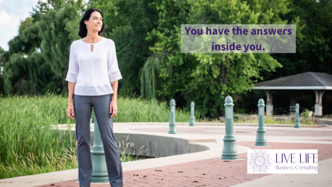 You have the answers inside you. Image: Denise looking out into the distance; Text: You have the answers inside you. Live Life Business Consulting