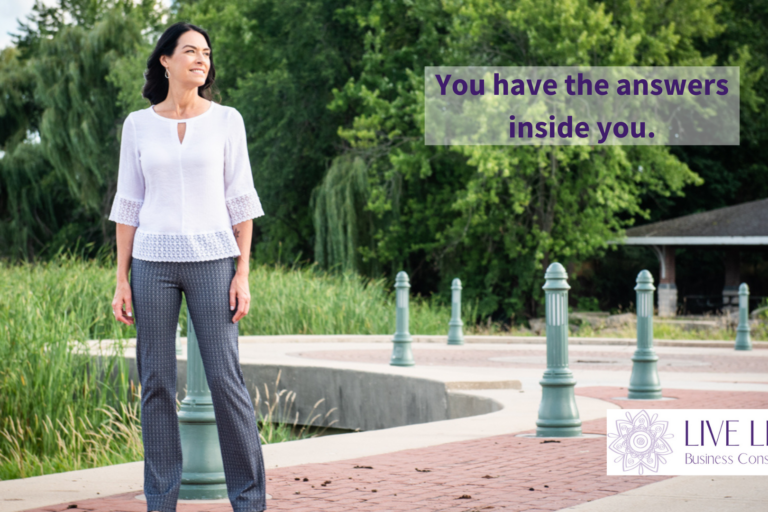 You have the answers inside you. Image: Denise looking out into the distance; Text: You have the answers inside you. Live Life Business Consulting